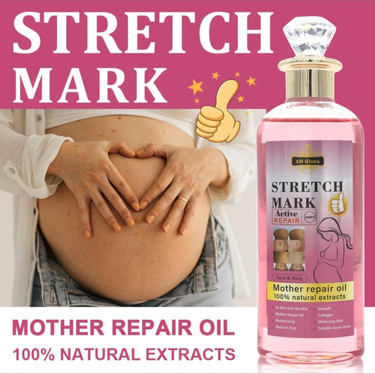Bottle of stretch mark repair oil with a pregnant belly and hands on a pink background